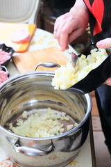 Preparing russian traditional salad Olivier