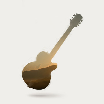electric guitar silhouette with sunset