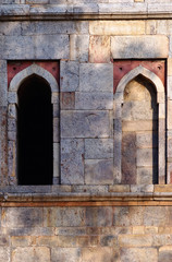 Fototapeta na wymiar arched window detail of ancient architecture, India