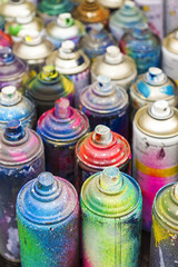 used cans of spray paint