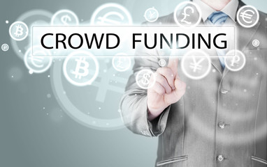 Businessman pushes virtual crowd funding button