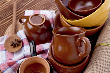 plates and cups on wooden table