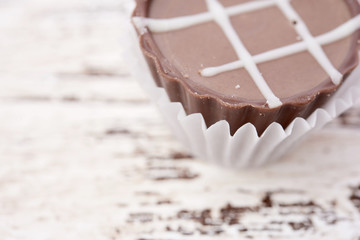 Dark chocolate on wooden background