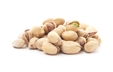 Heap of pistachios nuts isolated on the white