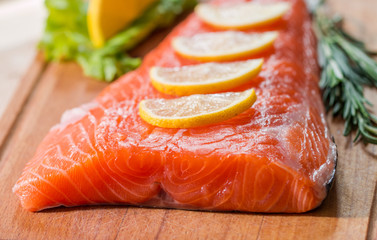 fresh salmon fillet with aromatic herbs, spices