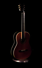 Obraz na płótnie Canvas Detail of an acoustic guitar with a shallow