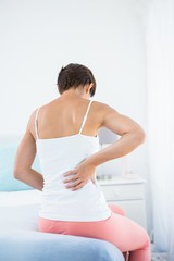 Fototapeta na wymiar Woman with back pain