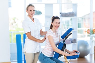 Woman having back massage