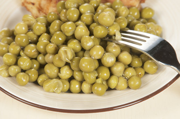 Chicken meat with green peas