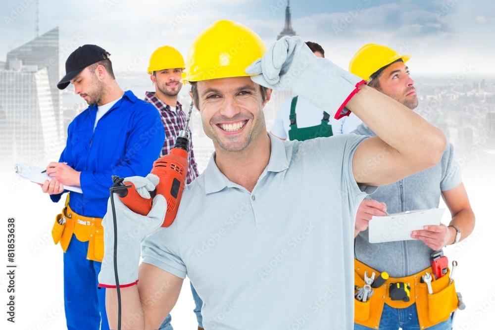 Poster composite image of handsome architect holding drill machine