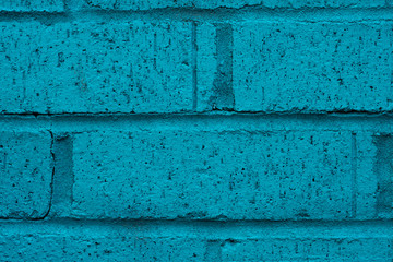 Close up of turquoise brick wall