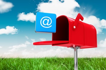 Composite image of red email postbox