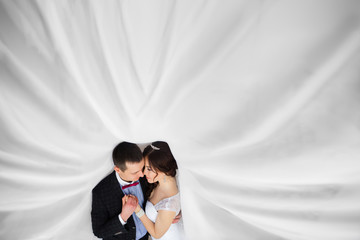 Just married under a veil caress