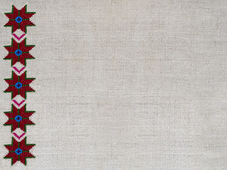 Ornament- ethnic Ukrainian embroidery on cannabic canvas
