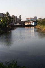 Fototapeta premium House beside a Bangkok canal