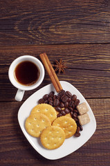 Plate with cookies and coffee