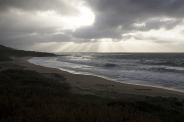 Fototapeta na wymiar landscape of rough sea, cloudy sky by storm and burst of light