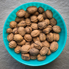 Organic walnuts in a bowl, close up, clean eating concept