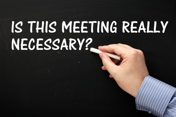 The question Is This Meeting Really Necessary on a blackboard