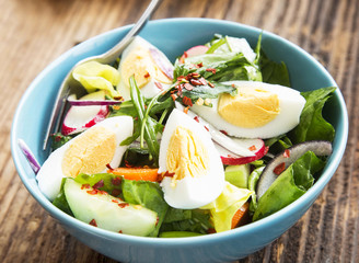 Healthy Vegetable Salad with Boiled Eggs and Chili Flakes