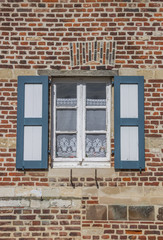 Window of an old house at the Vlierbeek abbey in Leuven