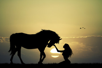 girl an horse at sunset © adrenalinapura