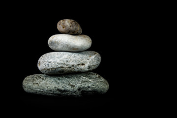 Stones on black background