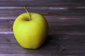 Apple on wooden background