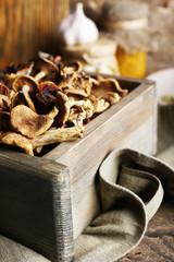 Dried mushrooms in crate, closeup