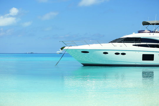Yacht parked at jetty in Baros Maldives