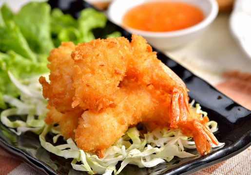 Fried Shrimp with vegetable on white plate