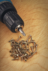 Electric drill and screws