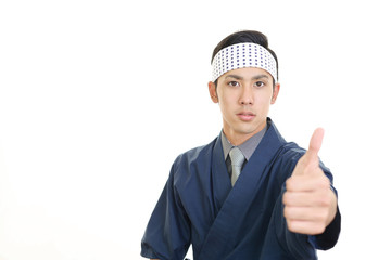 ガッツポーズの寿司職人