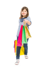 Young shopping girl walking