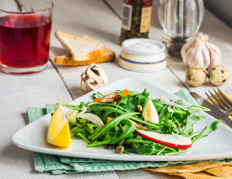 Fresh Salad With Arugula, Quail Eggs, Capers And Apple