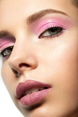 Naklejka premium Makeup closeup with purple eye shadow