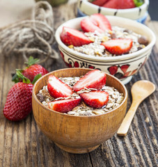 Breakfast with Muesli and Strawberry Fruits