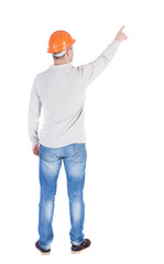 Back view of  pointing young men in  shirt and helmet.