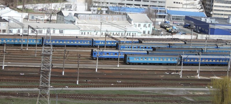 Trains waiting passengers at railway station