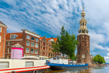Amsterdam canal and tower Montelbaanstoren Holland