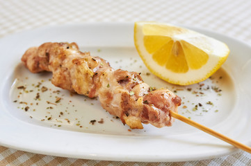 barbecue, grill skewer, pork (or chicken) on wooden grill spits