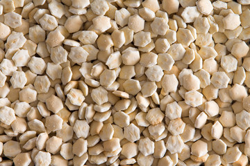 Background of small oven-baked oyster crackers