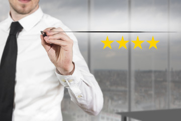 businessman pushing flat button four golden rating stars