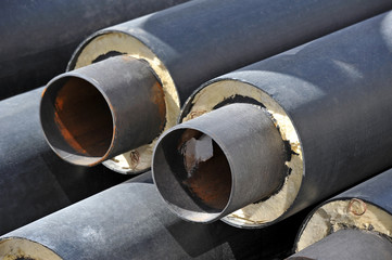 Steel pipe with heat insulation on construction site