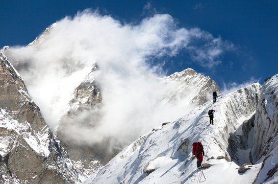 group of climbers on mountains montage to mount Lhotse