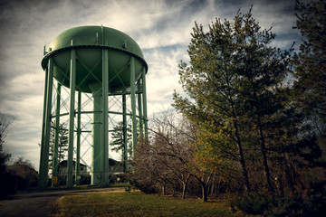 Tall Green Old Water Tower - obrazy, fototapety, plakaty