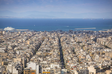 Obraz na płótnie Canvas Views of the Aegean sea and streets labyrinth of Greek capital.