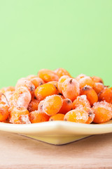 Hippophae rhamnoides on wooden table