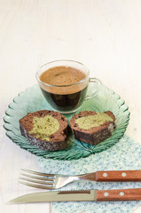 Two slices of cake and cup of black coffee