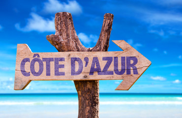 Cote D'Azur wooden sign with beach background